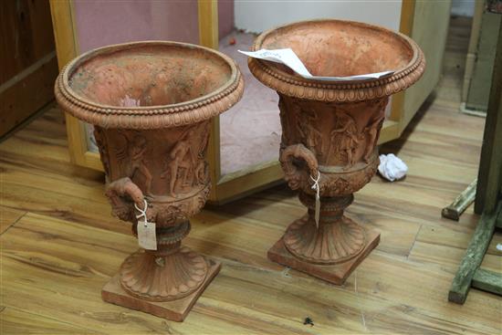 A pair of Victorian terracotta campana urns, H.1ft 8in. Diam.1ft 2in.